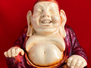 Buddha rosso in resina